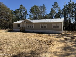 Building Photo - 5597 Acadia St