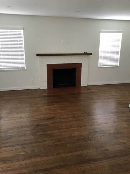 living room with new floors and paint - 12706 Dewey St