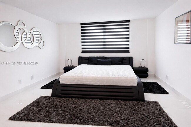 Building Photo - 19380 Collins Ave