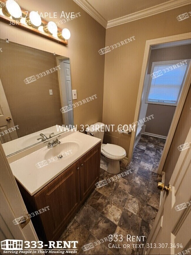 Building Photo - 7917 Maple Ave