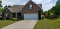 Building Photo - 4 bedroom home with fenced backyard locate...