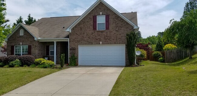Primary Photo - 4 bedroom home with fenced backyard locate...