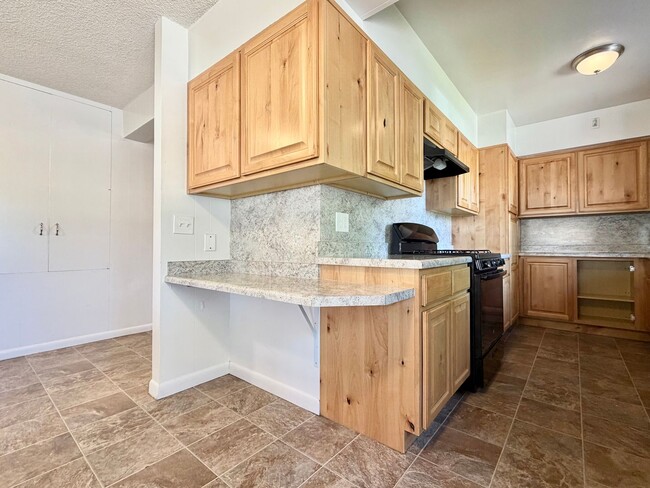 Building Photo - Inviting Holladay Home with Large Yard, Carport & Extra Parking