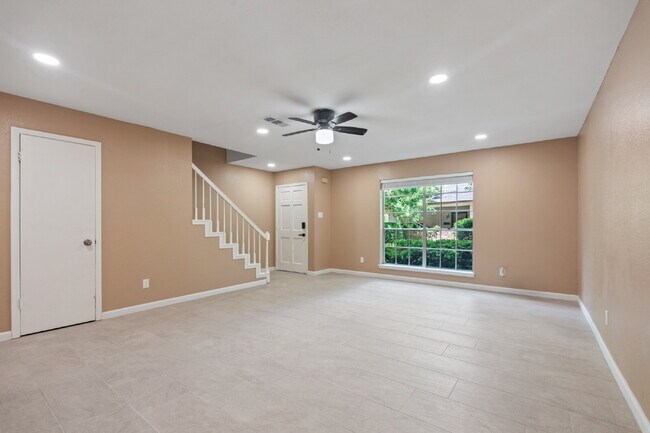 Building Photo - Furnished Option, Modern Comfort & Private Gated Patio!