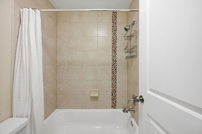 Building Photo - Stylish Two-Level Condo in Gables of Tuckerman Near Pike & Rose!