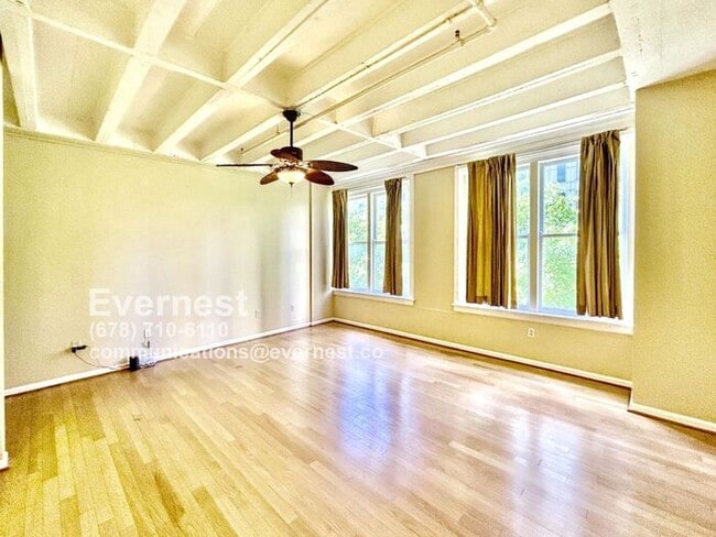 Building Photo - Cozy 1-Bedroom Condo with Convenient Acces...