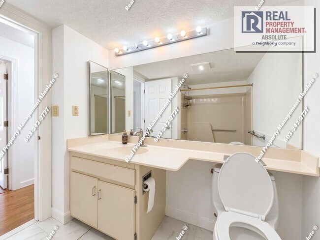Building Photo - Spacious 2BR/2BA Condo with Garage, Balcony, Pool & Mine Falls Access