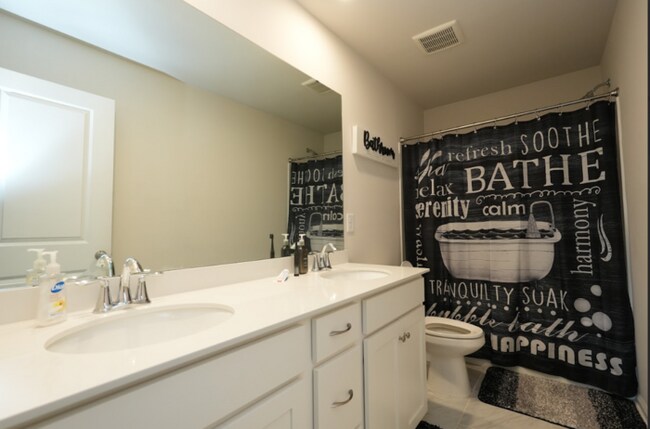 Building Photo - Spacious 4-Bedroom Home with Modern Comforts