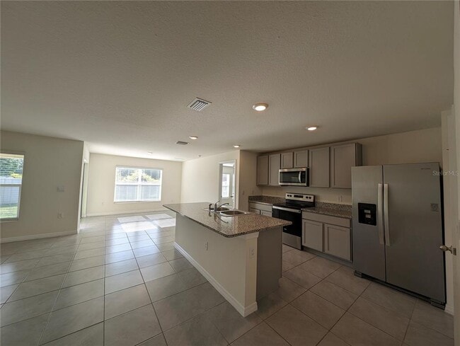 Building Photo - 8661 Triumph Cir