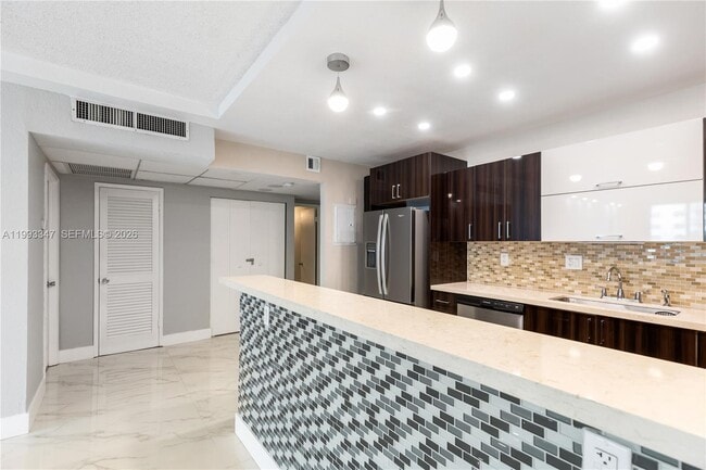 Building Photo - 19380 Collins Ave