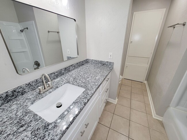 Building Photo - Welcome to your dream rental! This meticulously remodeled 3-bedroom, 2-bathroom home in the heart...