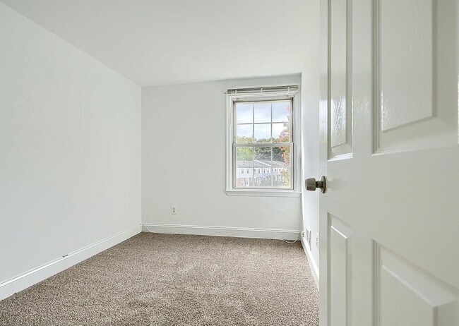 Building Photo - Updated End-of-Group Townhome with Finished Lower Level, Fenced Yard & Community Pool
