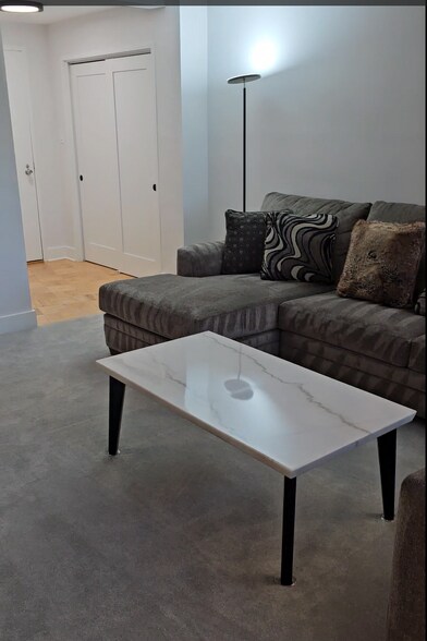 sectional/sleeper couch and coffee table - 10201 Grosvenor Plz
