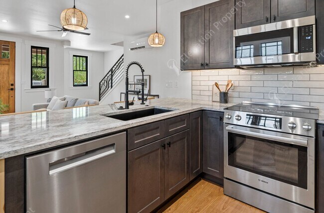 Building Photo - Experience Sustainable Luxury in this Prem...