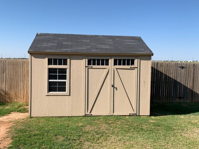 Building Photo - Solar Panels and Alarm System Included!!