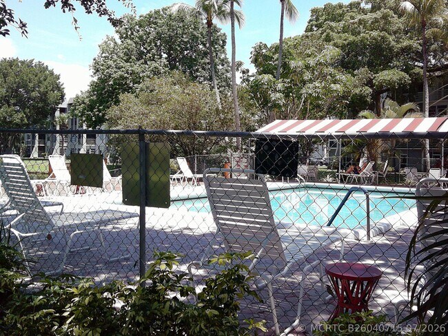 Building Photo - 9420 Poinciana Pl