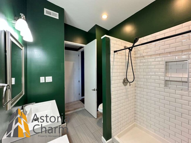 Building Photo - Beautifully Renovated 3BR Rowhome Near Johns Hopkins – Gated Parking + Modern Upgrades