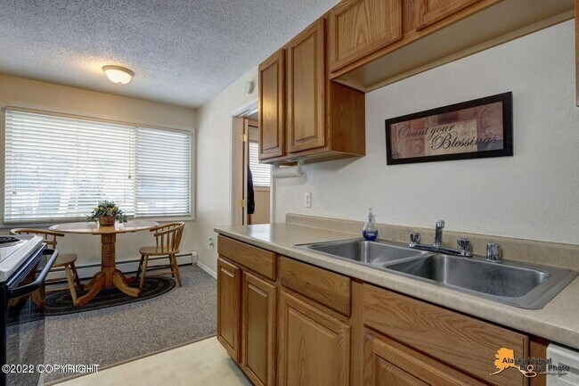 Building Photo - Akins Real Estate