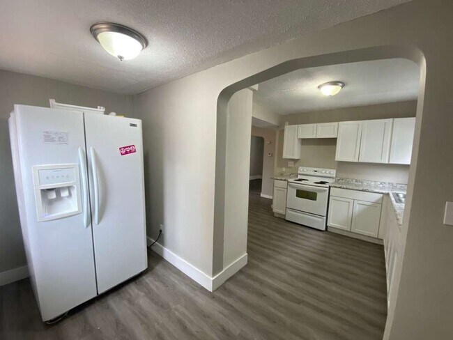 Building Photo - Move-In Special – $300 rent credit after 6 months of on-time payments!