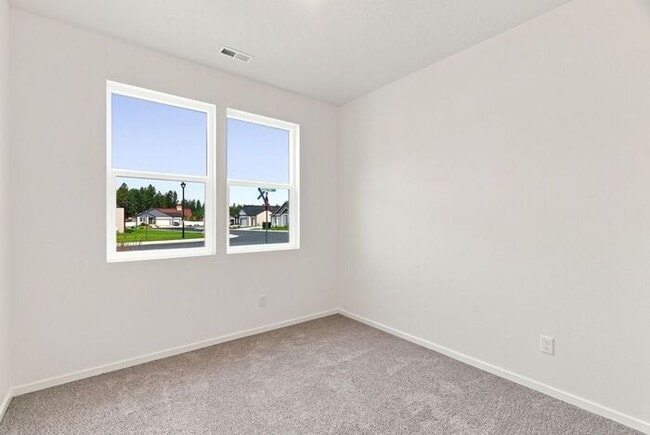 Building Photo - Modern 4-Bedroom Home with a 3-Car Garage & Covered Patio