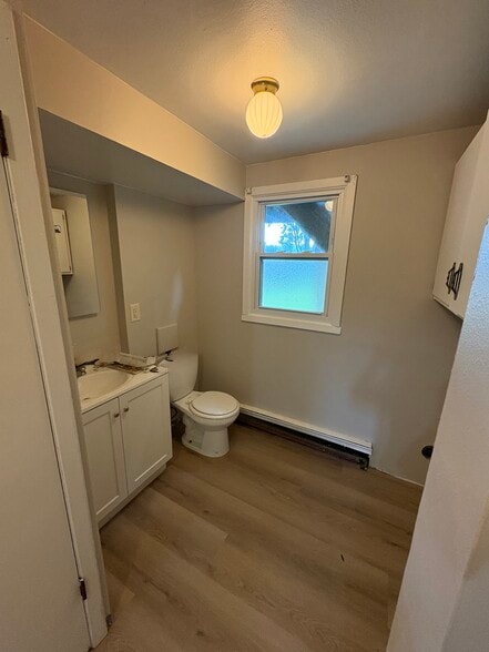 Washer and dryer hookup are located in the half bath on bottom level. - 1511 S Point Rd