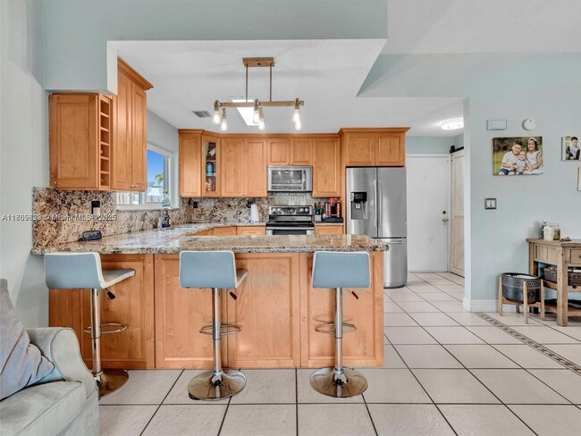 Building Photo - 11310 SW 58th Ct