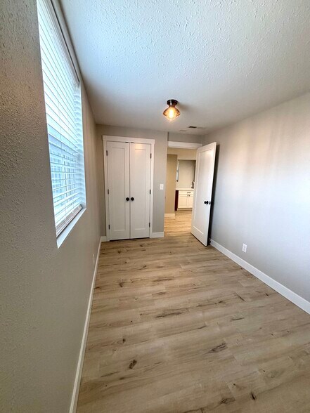 Bedroom two with dual door storage - 2026 Lombard Ave