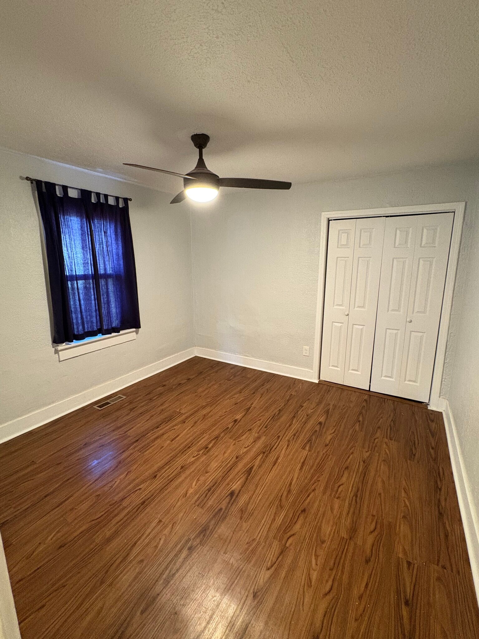 Back bedroom with ceiling fan - 1509 Layman St