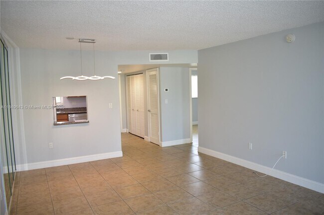 Building Photo - 8590 Sunrise Lakes Blvd