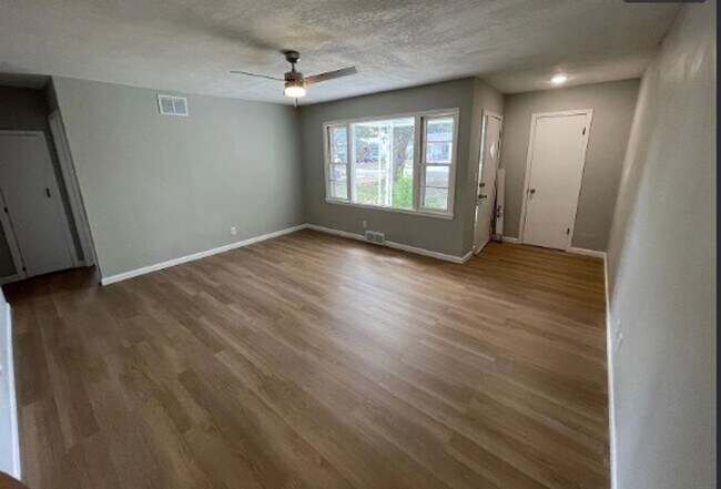 Building Photo - Welcome to Your Next Home with Harvest Investments!