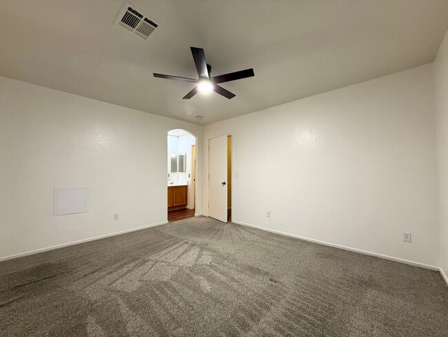 Building Photo - $500 OFF 1ST MONTHS RENT Updated 3-Bedroom Townhome in Gated Community with Pool Access