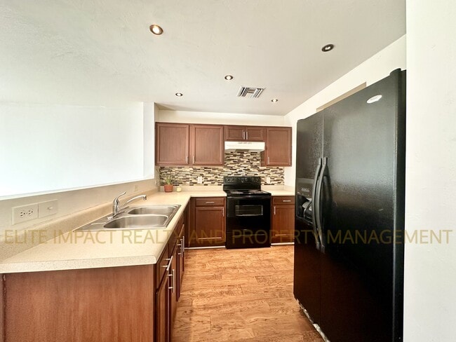 Building Photo - 5210 E Desert Straw Ln