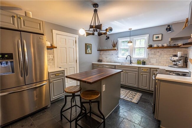 Building Photo - Stunning 4-Bedroom Home with Attached Garage and Fenced Yard