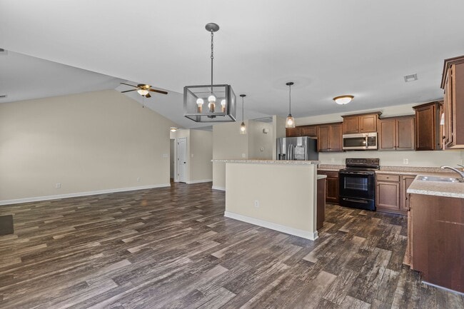 Building Photo - Spacious Home with Natural Light