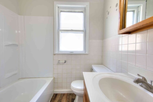 Building Photo - Available Aug 7th - Very nice single family home with refinished hardwood and a very large open l...