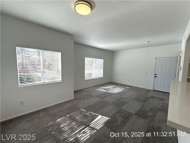 Building Photo - SPACIOUS FIRST-FLOOR CONDO LOCATED IN A GA...