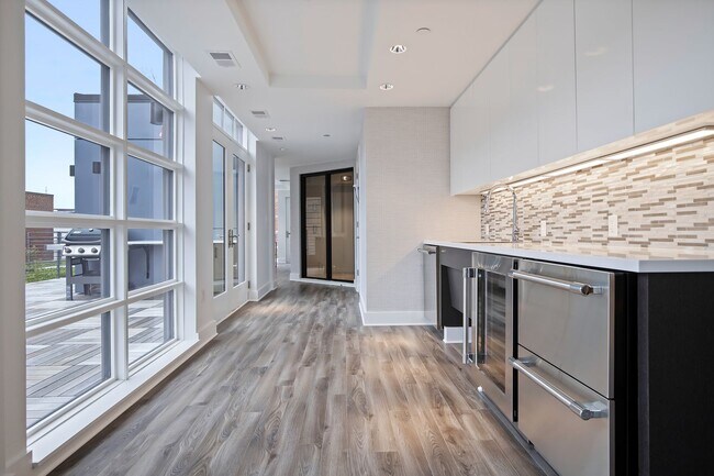 Building Photo - Elegant 2BR at The Adora | 1,500+ SF, Chef’s Kitchen & Garage Parking!