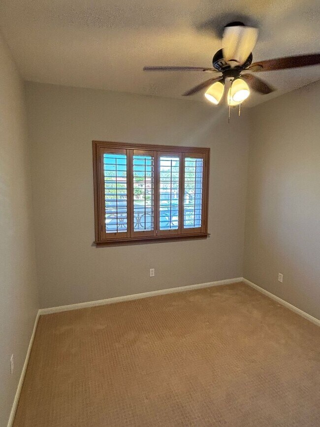 Building Photo - Gated Green Valley Ranch Townhome | 2 Bed | 2.5 Bath | 2-Car Garage