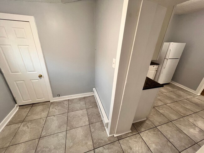 Building Photo - Updated 3 Bedroom 1.5 Bath Townhome w/ Paved Yard + Washer & Dryer