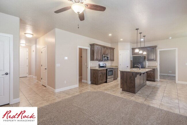 Building Photo - Dog Friendly, Pleasant 4 Bedroom, 2.5 Bathroom Townhome