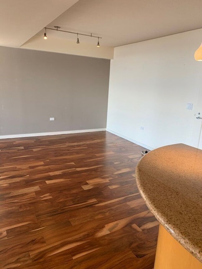 Building Photo - Moana Pacific - 2 bedroom plus den, 2 bath Condo with 2 parking - avail now!