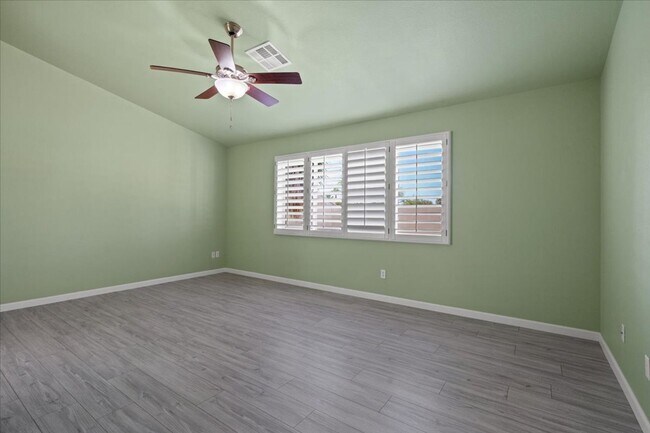 Building Photo - Multiple Living Areas 4-Bedroom Retreat with Vaulted Ceilings & No Carpet