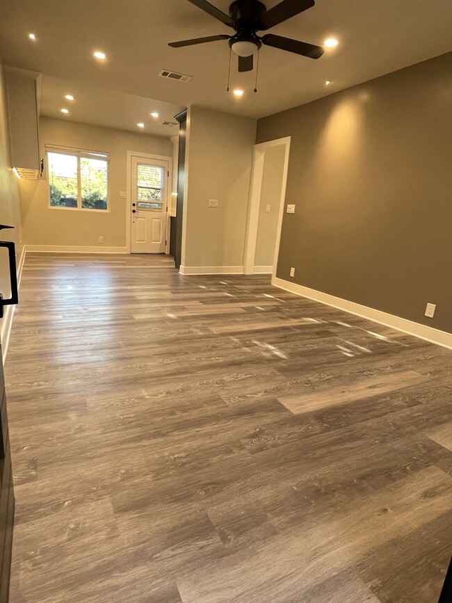 Living Room/Dinning Room (dual pane windows, lots of natural light, recessed dimmable lighting) - 3211 W Alameda Ave