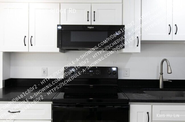 Building Photo - 2 bed/2 Bath with full basement & Den