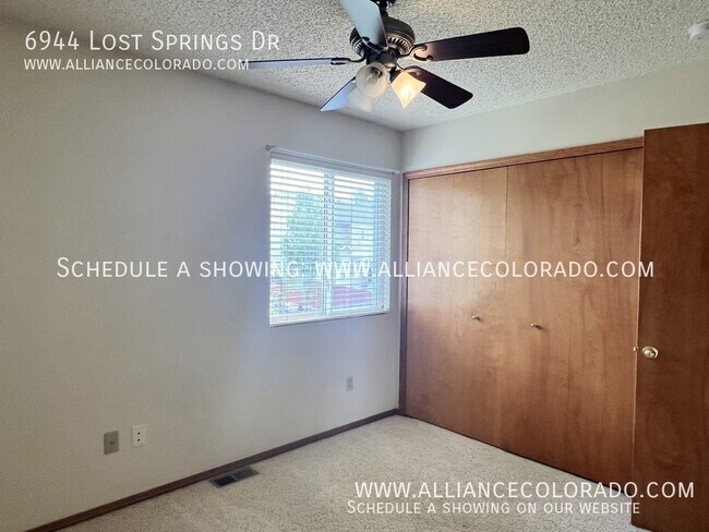 Building Photo - 6944 Lost Springs Dr