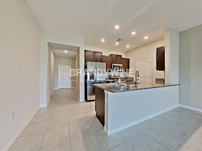 Building Photo - NEW LOWER RENTAL RATE LEASING SPECIAL: Rec...