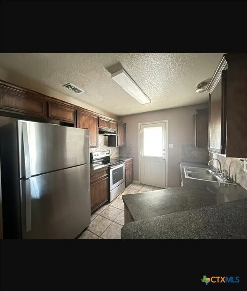 Building Photo - 3600 Dustin Ct