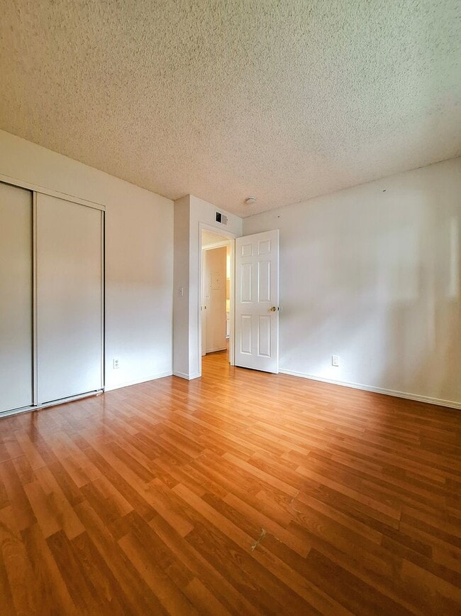 Building Photo - Beautiful 2bd Condo In Gated Community With Pool, Gym, and On-site Laundry