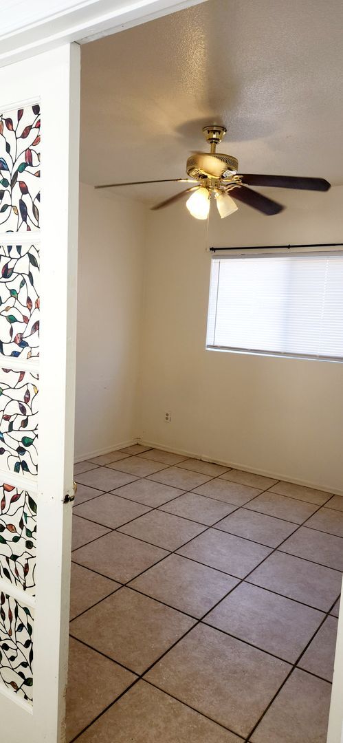 Building Photo - Large 4 Bedroom- A/C- All Ceramic Tile- Wo...