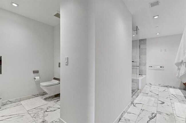 Building Photo - 10203 Collins Ave